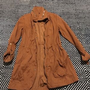 Rust rain coat